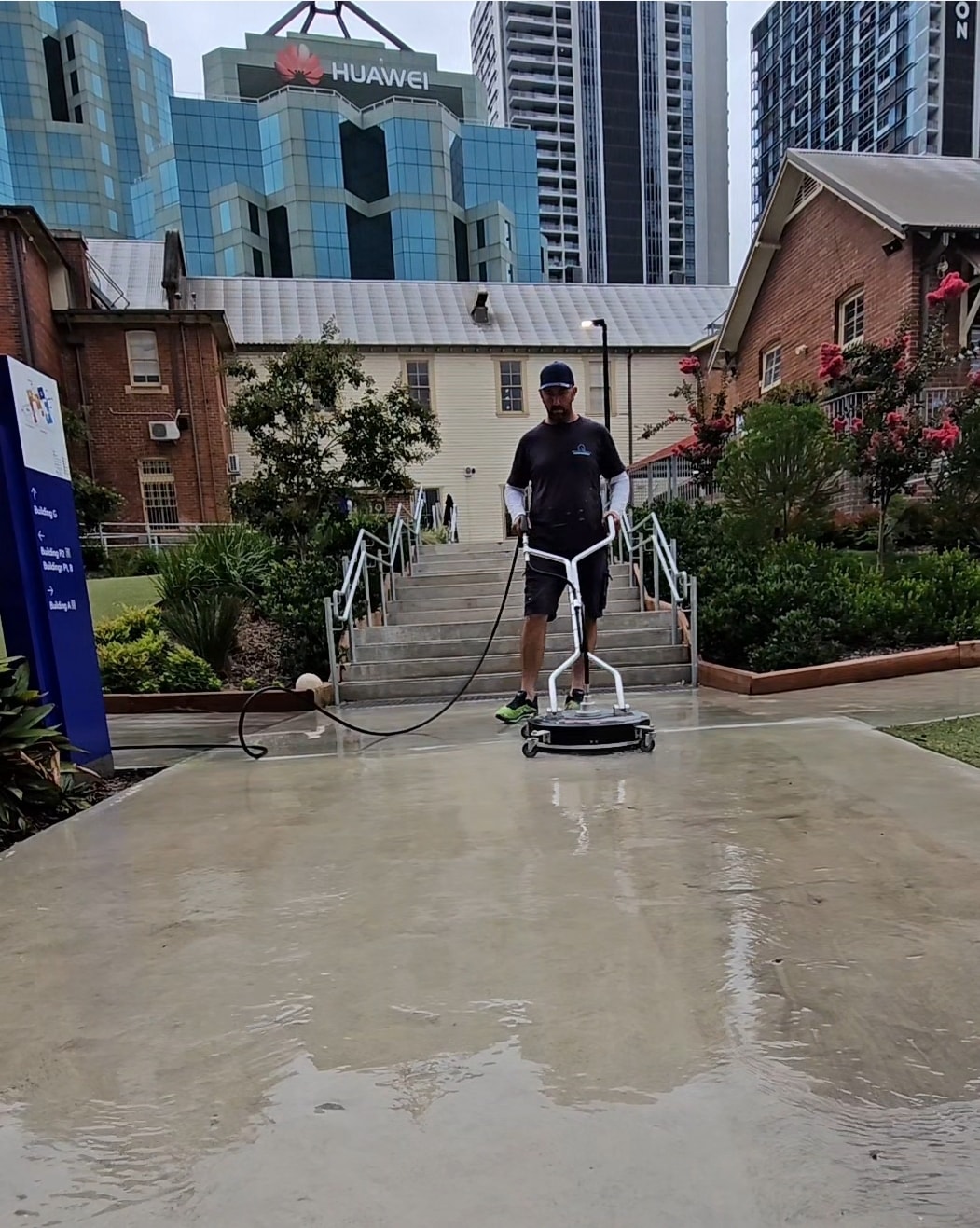 Clean concrete driveway after pressure washing
